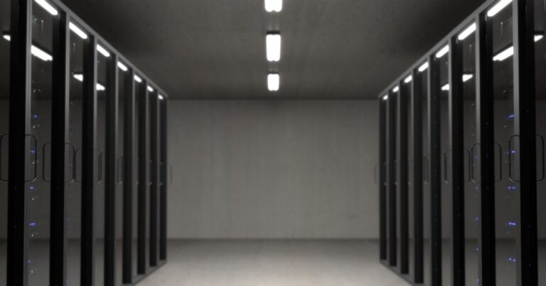Rows of server racks in a data center, illustrating VPS, dedicated and cloud server hosting